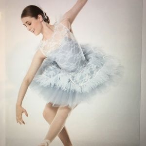 White and gray dress with tutu and hairpiece